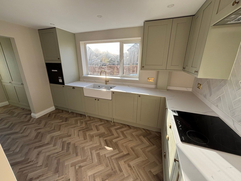 Sage Shaker Kitchen with Belfast Sink and Herringbone Floor
