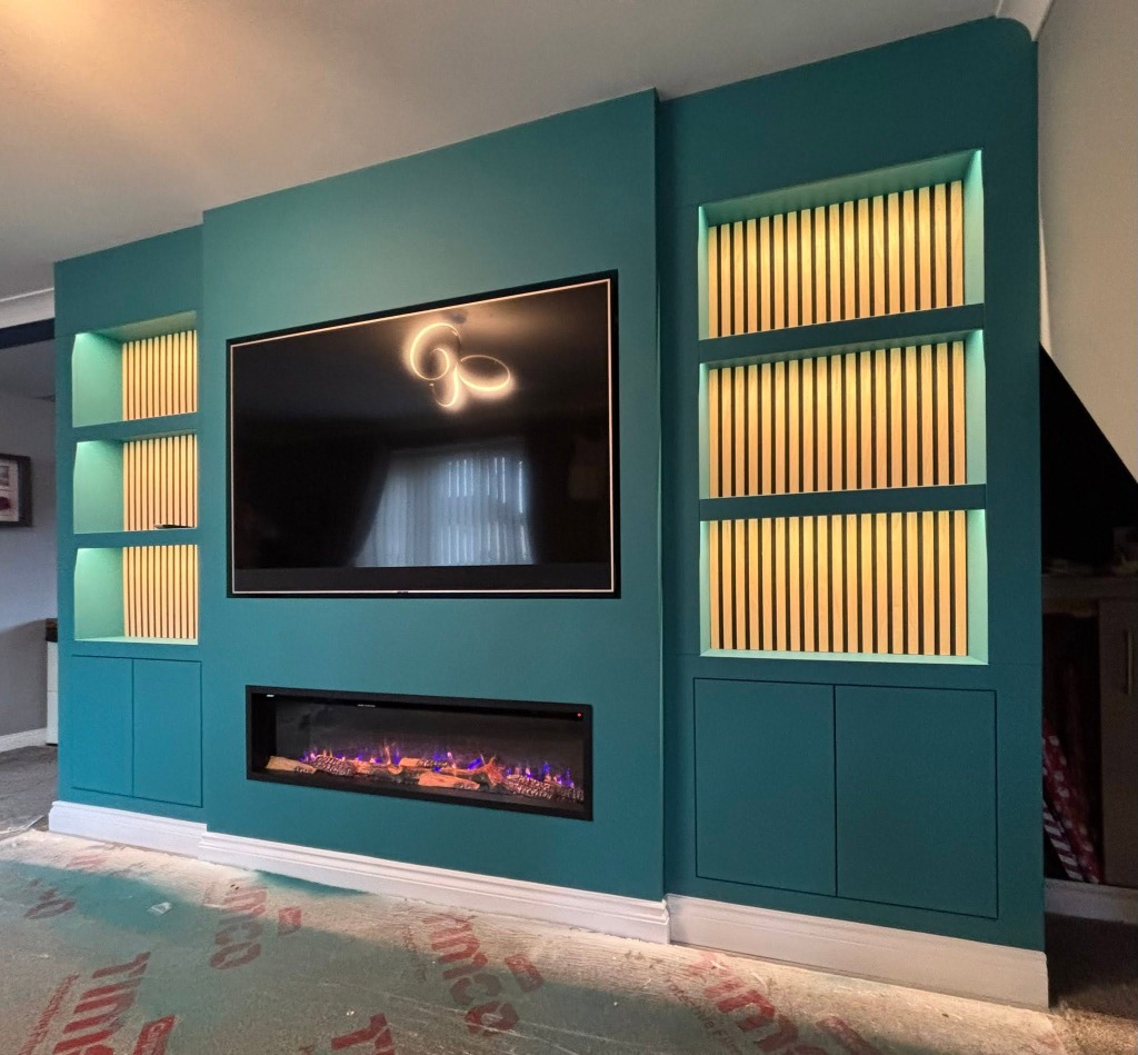 Bespoke Peacock Teal Media Wall with Fireplace and Oak Slats